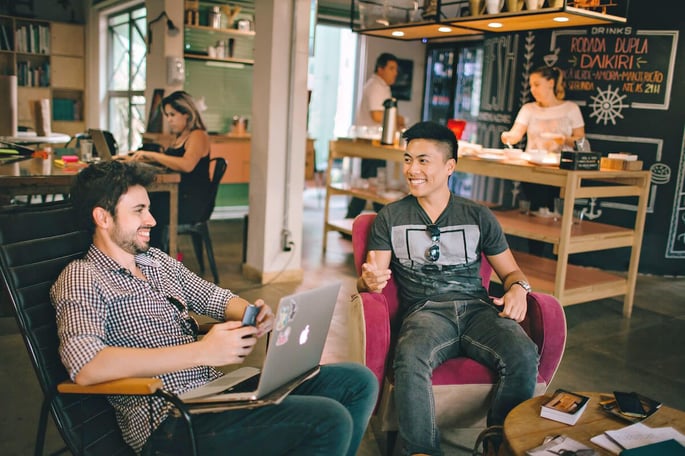employees laughing together