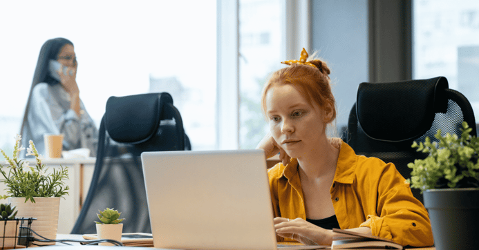 A woman working with recruitment on her laptop.
